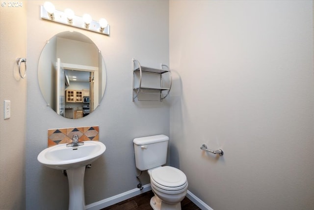 bathroom featuring toilet