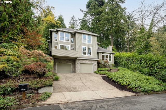 view of front of property with a garage