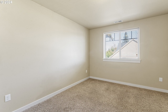 view of carpeted spare room