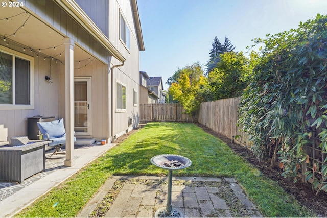 view of yard featuring a patio