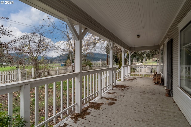 wooden terrace featuring a mountain view