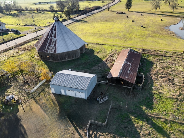 birds eye view of property featuring a rural view