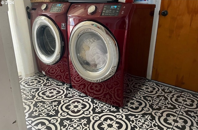 washroom with washer and clothes dryer