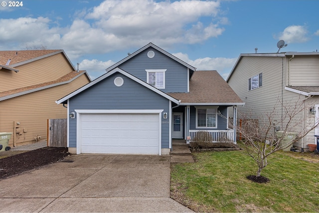 view of front of property featuring covered porch, a garage, and a front yard