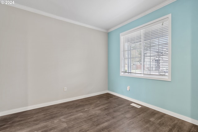 unfurnished room featuring dark hardwood / wood-style flooring and ornamental molding