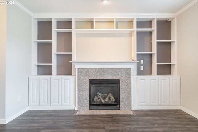 unfurnished living room with dark hardwood / wood-style floors and ornamental molding