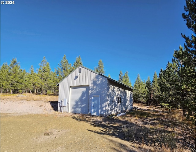 view of outbuilding featuring a garage