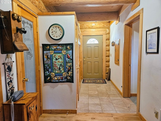 hall with light hardwood / wood-style floors