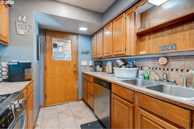 kitchen featuring appliances with stainless steel finishes and light tile patterned floors