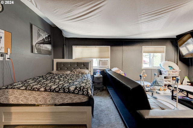 bedroom featuring cooling unit and carpet flooring