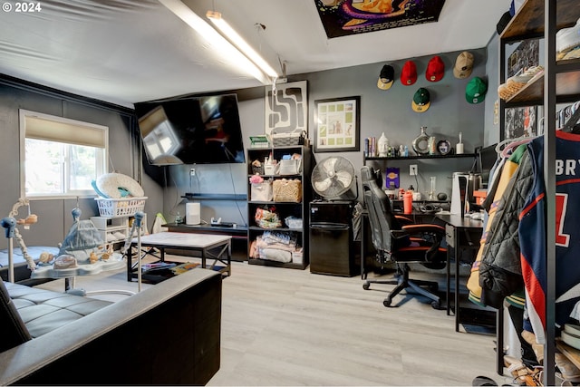 office space with light hardwood / wood-style floors