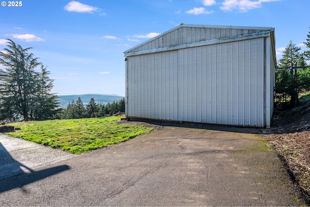 view of outdoor structure with a mountain view