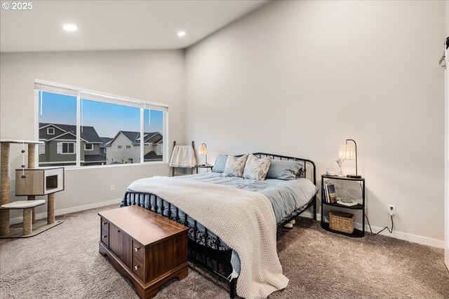 bedroom featuring recessed lighting, carpet flooring, and baseboards