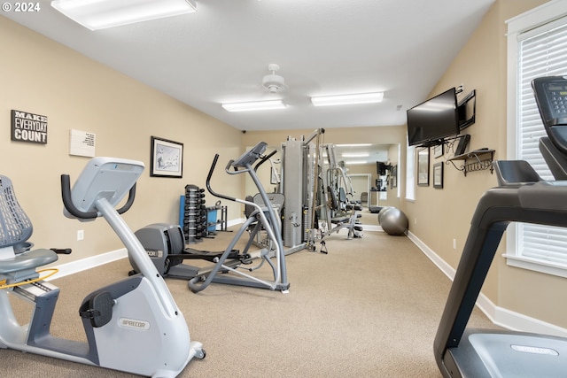 exercise room with baseboards