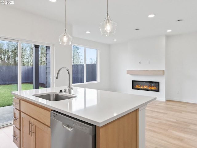 1923 NW 18th Ave, Battle Ground, WA 98604 - kitchen featuring sink, dishwasher, a center island with sink, decorative light fixtures, and light brown cabinets