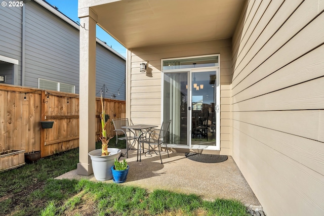 view of patio / terrace with fence and outdoor dining area