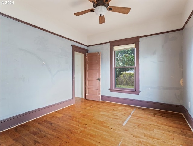 spare room featuring ceiling fan and light hardwood / wood-style floors