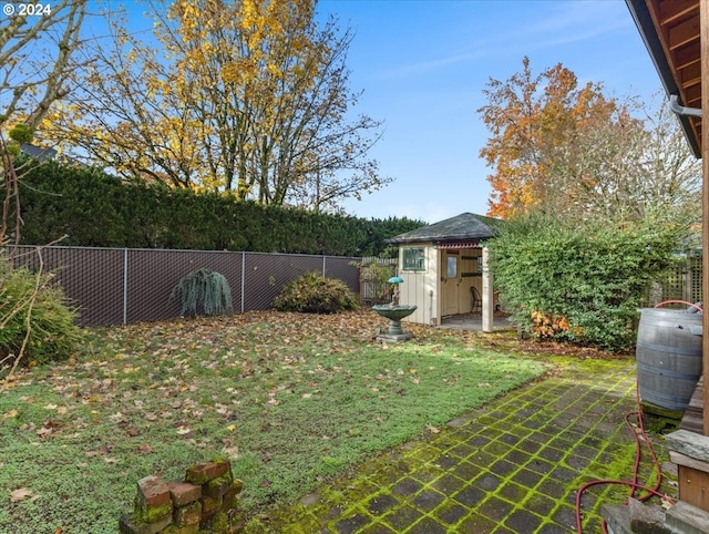 view of yard featuring a gazebo and a patio