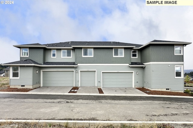 view of front of property featuring a garage