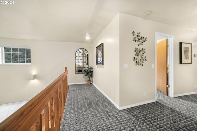 hall featuring carpet floors