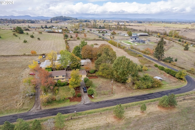 aerial view featuring a mountain view and a rural view