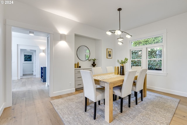 dining space featuring light hardwood / wood-style flooring