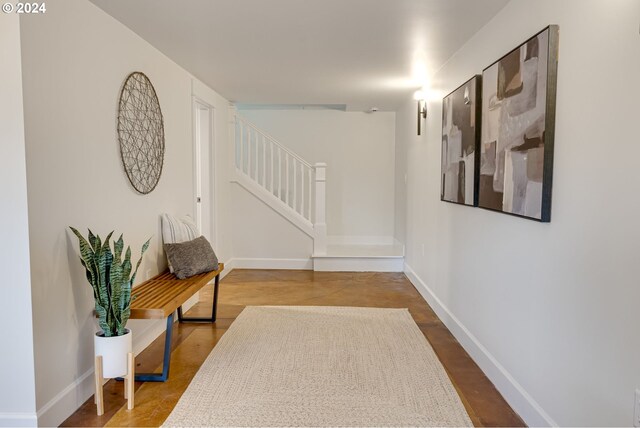 hall featuring wood-type flooring