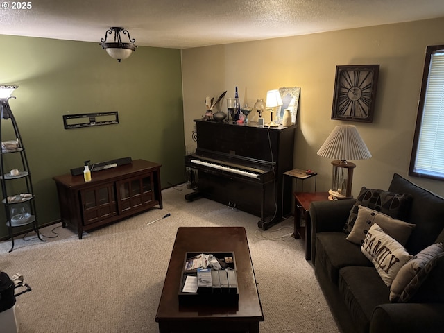 living room featuring light colored carpet and a textured ceiling