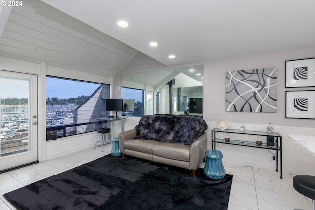 living room featuring lofted ceiling