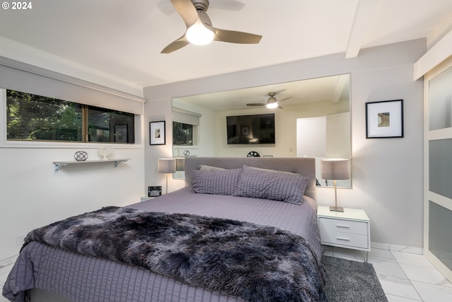 bedroom featuring ceiling fan