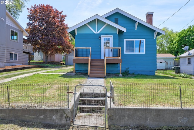 bungalow with a front yard