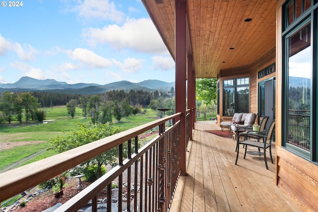 balcony featuring a mountain view