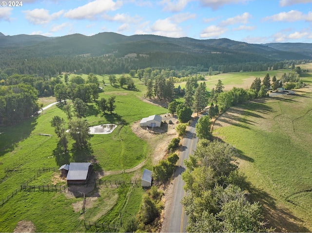 aerial view featuring a mountain view and a rural view