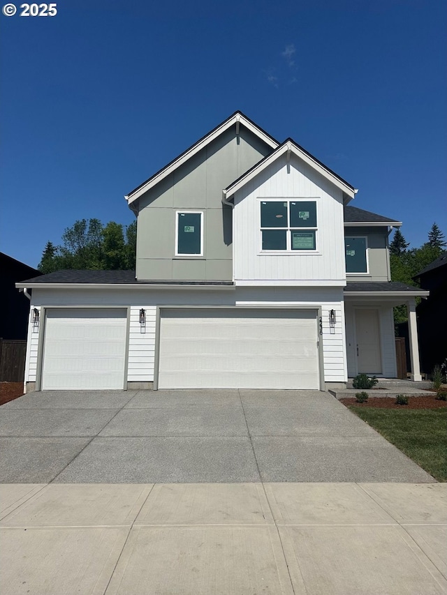 2236 Ash St Unit 21, Woodland, WA 98674 - view of front of house featuring a garage and driveway