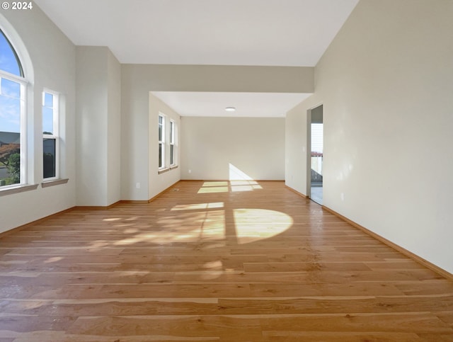 empty room featuring wood-type flooring