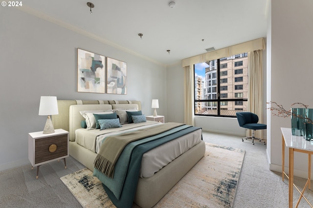 carpeted bedroom with crown molding