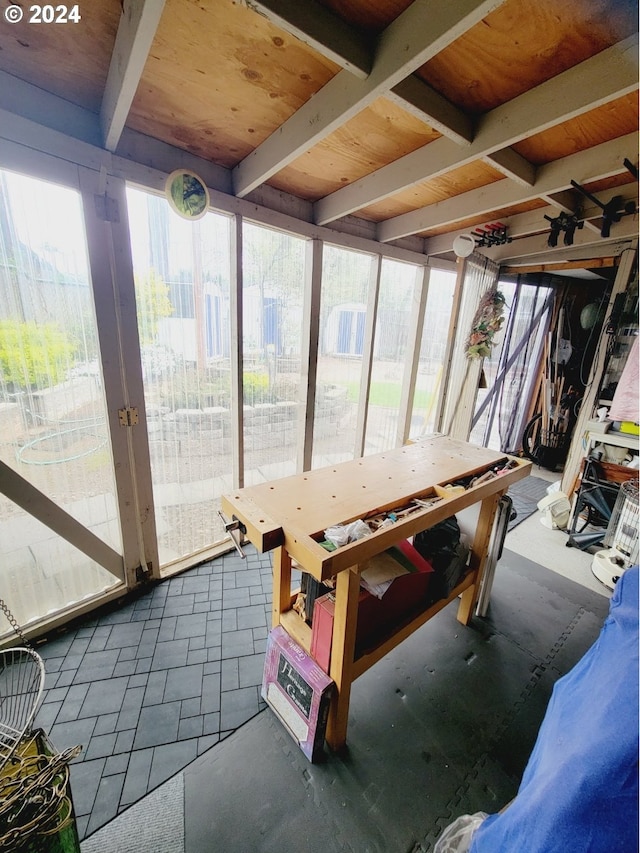 unfurnished sunroom with a healthy amount of sunlight