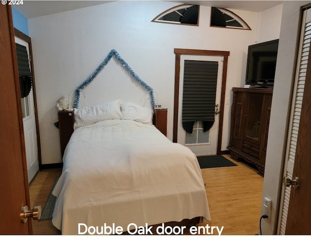 bedroom with light wood-type flooring