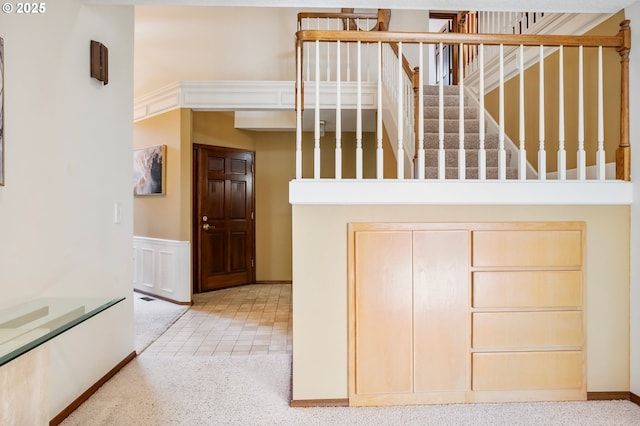 stairway with carpet floors