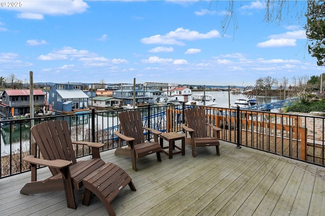 wooden deck with a water view