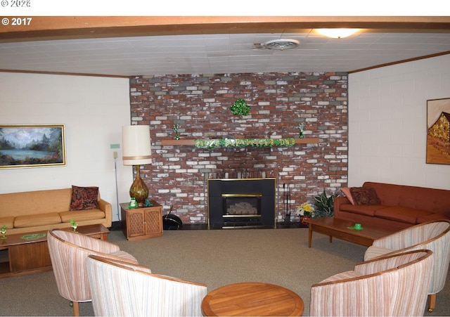 carpeted living room featuring crown molding and a brick fireplace