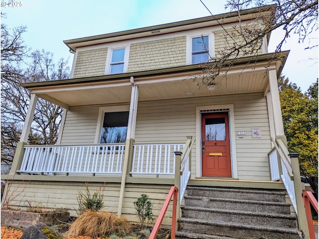 view of front of property featuring covered porch