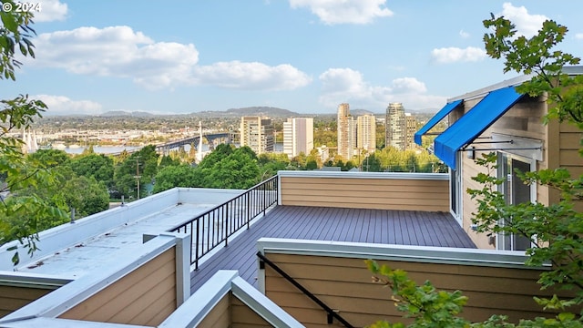 balcony featuring a view of city