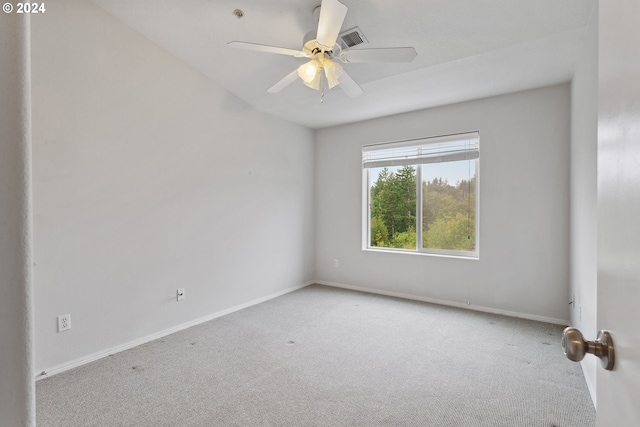 empty room with light carpet and ceiling fan