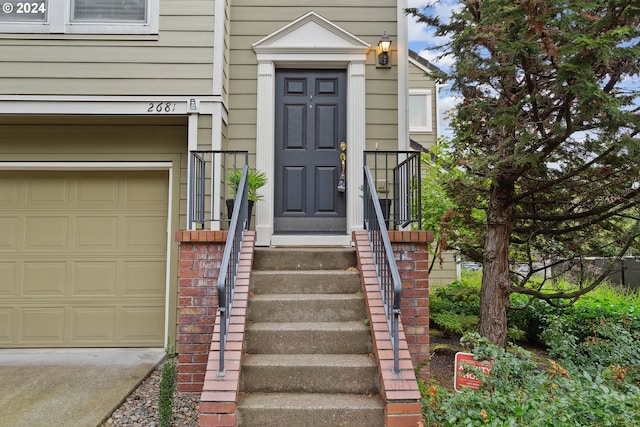 property entrance featuring a garage