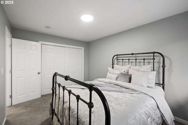 bedroom featuring a closet and carpet