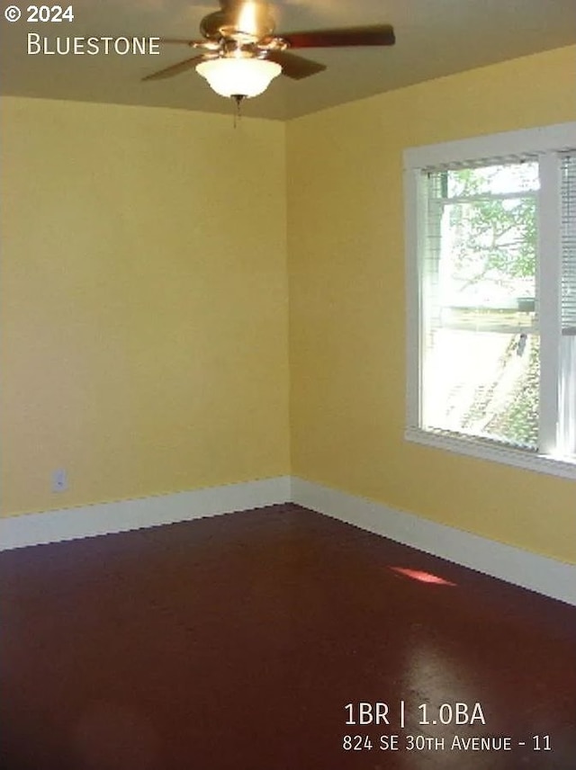 unfurnished room featuring ceiling fan