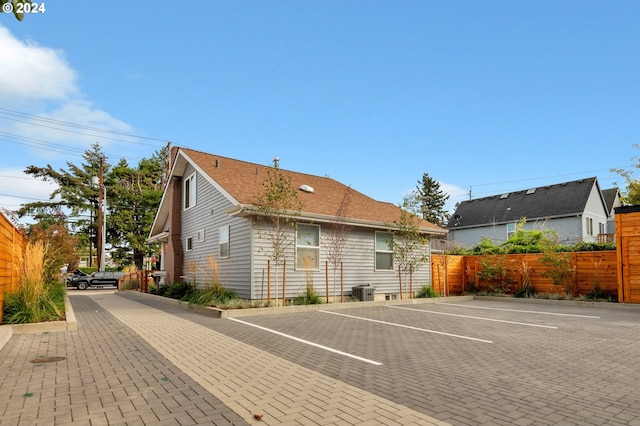 view of home's exterior with central air condition unit