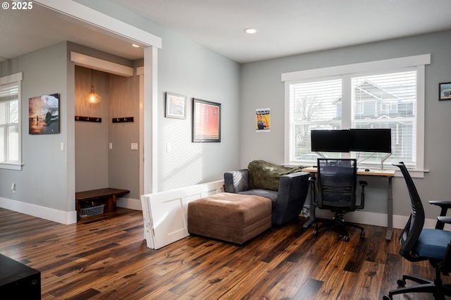 office area featuring dark wood-type flooring and plenty of natural light