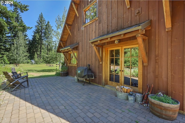 view of patio with french doors and area for grilling